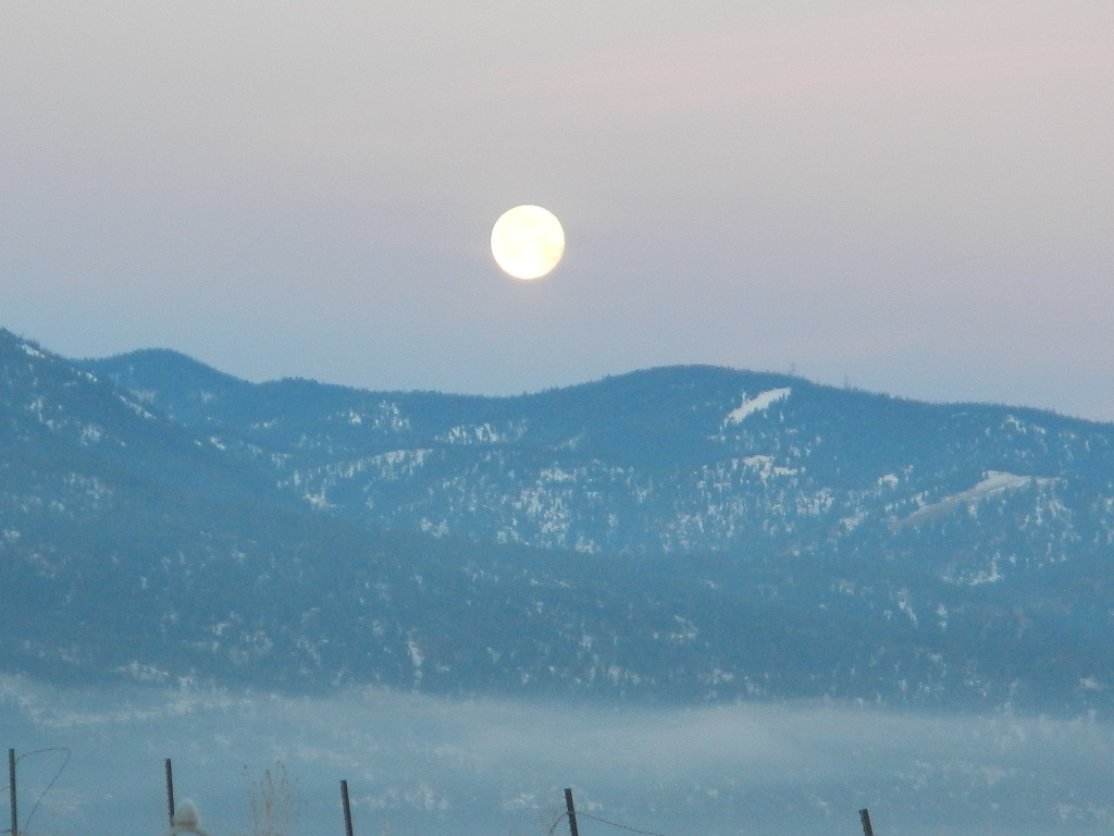 full moon at sunrise winter in montana full moon at sunrise winter in montana
