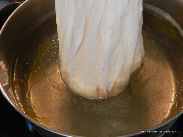 honeycomb melting and beeswax seeping out of cheesecloth when rendering beeswax from honeycomb