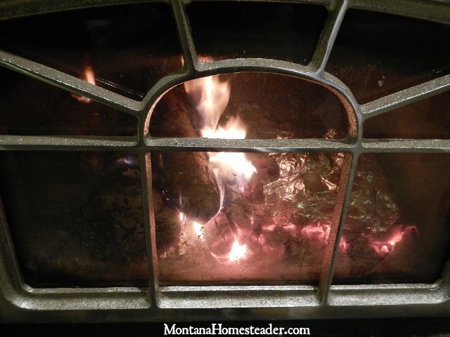 Baking potatoes inside a wood stove | Montana Homesteader