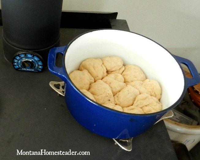 Baking and Cooking a chicken dinner on a wood stove | Montana Homesteader