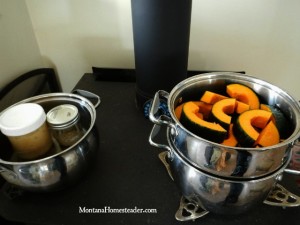 Steaming vegetables and warming honey on the wood stove Montana Homesteader
