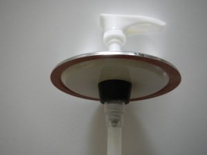 How to turn a canning jar lid into soap lotion dispenser