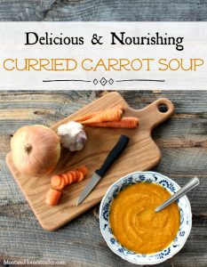 Homemade carrot curry soup with onion and garlic