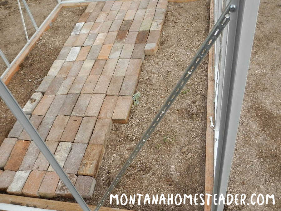 How to build a greenhouse kit anchored to the ground stabilize it for wind and snow by adding metal cross braces