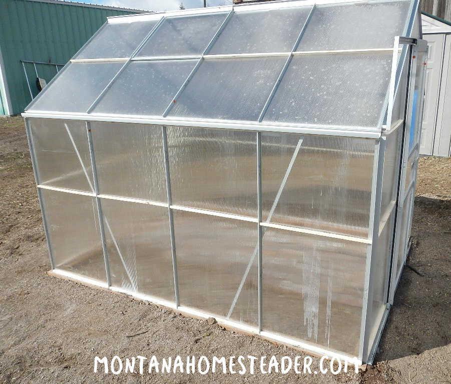 How to install build a greenhouse kit stabilized for wind and snow by anchoring it to the ground adding wood and metal cross supports and bracing
