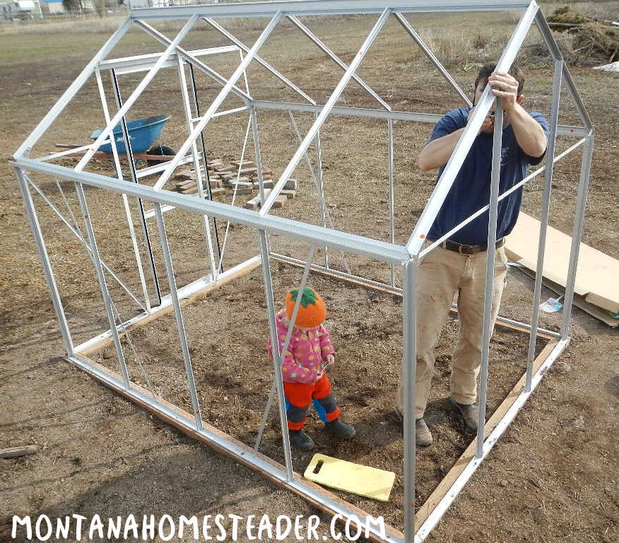 How to assemble a greenhouse kit and anchor it to the ground stabilize for wind and snow