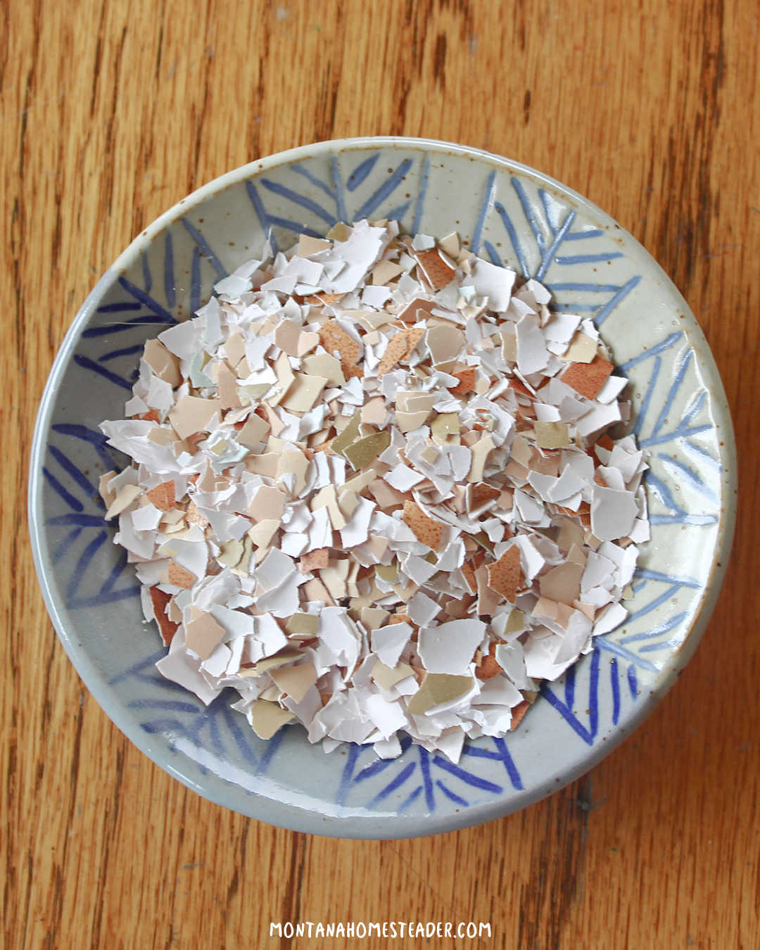 How to naturally encourage egg laying in chickens what supplements to feed them bowl of crushed egg shells to feed chickens to increase calcium to lay more eggs