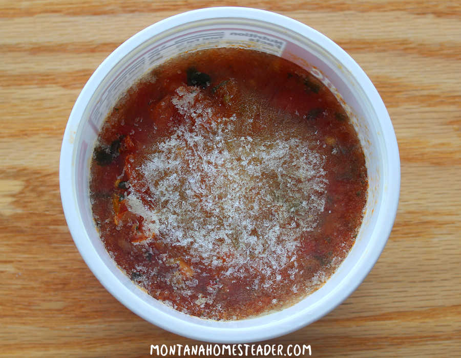 How to preserve garden fresh salsa without canning freeze salsa in freezer safe container with headspace to allow for expansion frozen salsa in container with a few ice crystals on top before thawing