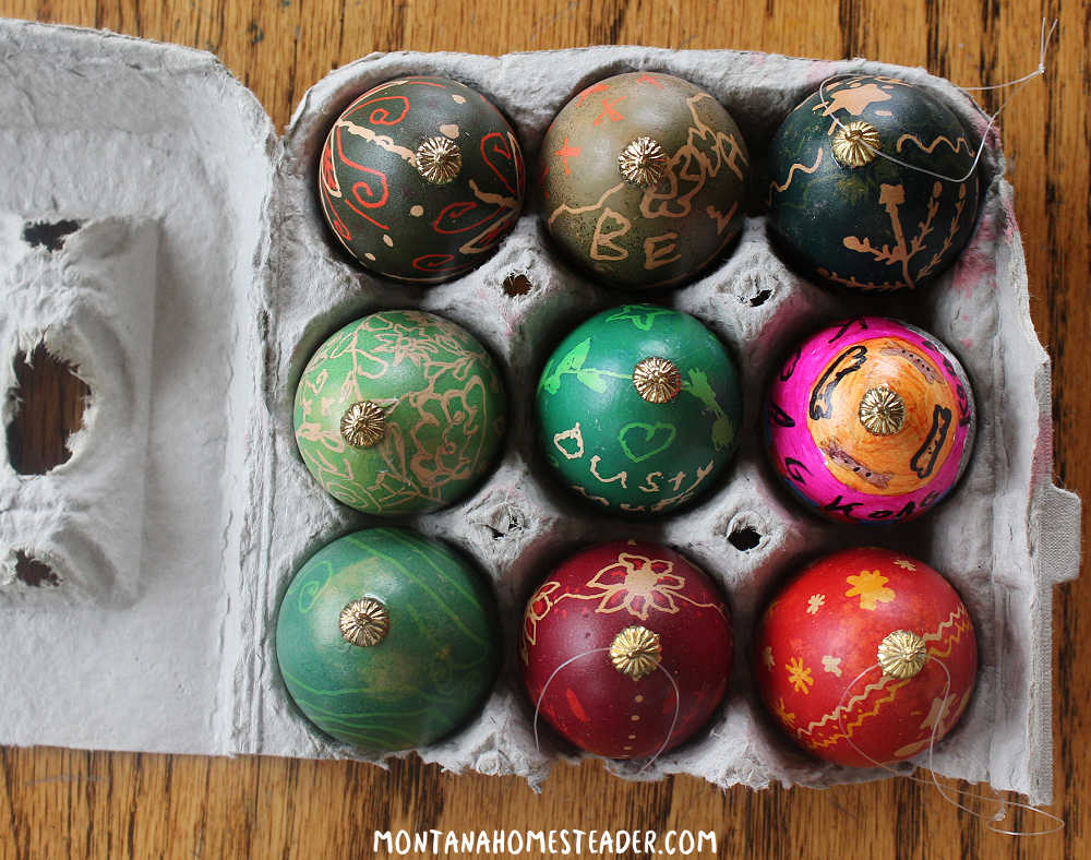 How to safely store blown egg ornaments in egg cartons cut egg carton in half full of decorated blown eggs ready for safe storage